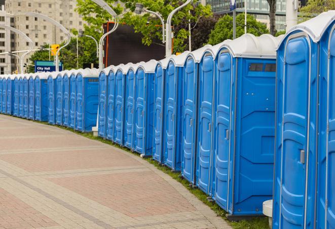 hygienic portable restrooms lined up at a music festival, providing comfort and convenience for attendees in Bart PA